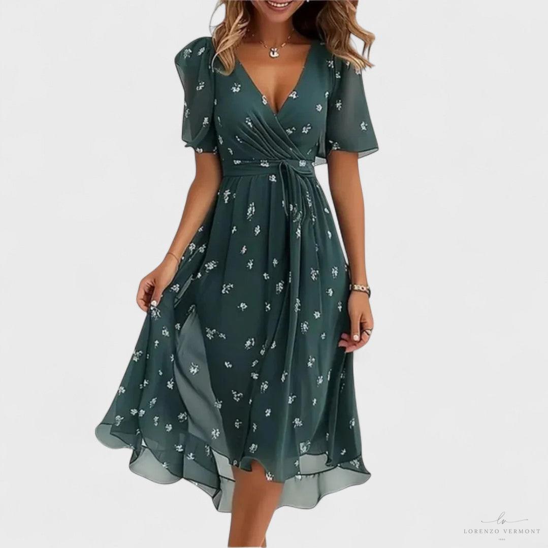 Vestido acuarela con escote en V y vuelo elegante
