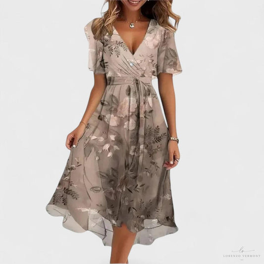 Vestido acuarela con escote en V y vuelo elegante