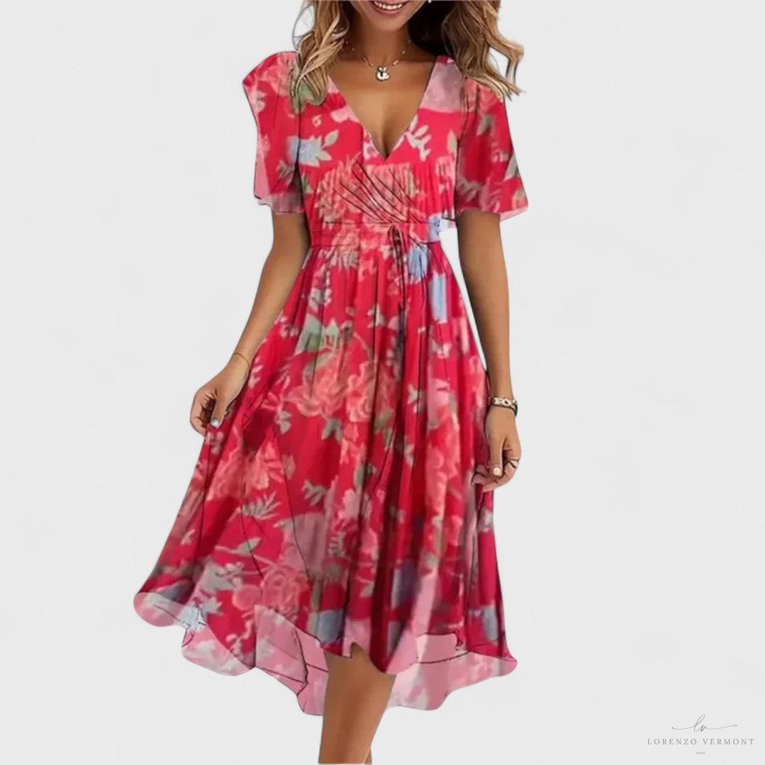 Vestido acuarela con escote en V y vuelo elegante